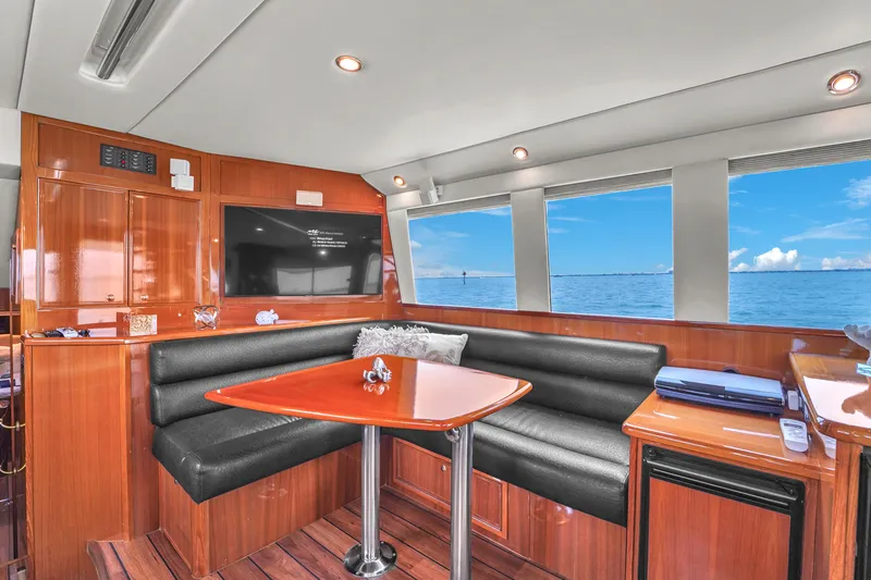  Yacht Photos Pics Luxurious interior of 2008 Riviera 51 Enclosed Bridge yacht with ocean view.