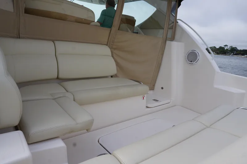 The Pearl Yacht Photos Pics 2007 Tiara Yachts 3900 Sovran interior with beige seating and water view.