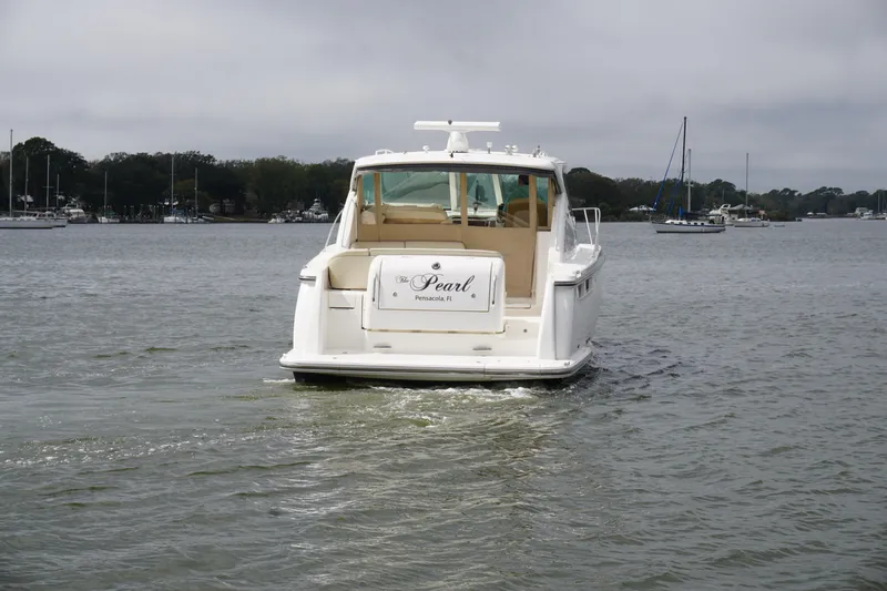 The Pearl Yacht Photos Pics 2007 Tiara Yachts 3900 Sovran on water, rear view, overcast sky.