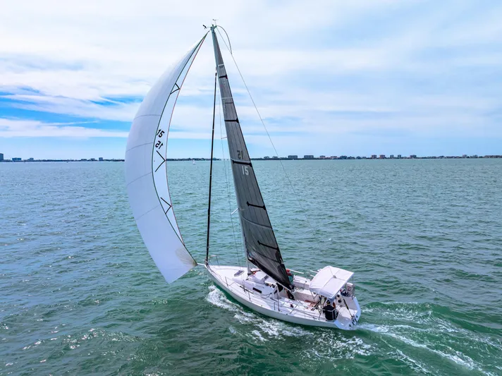 Encore Yacht Photos Pics 2011 J Boats J/95 sailing on open water under clear skies.