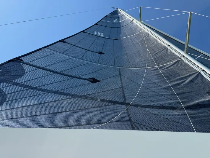 Encore Yacht Photos Pics Sail of 2011 J Boats J/95 against clear blue sky.