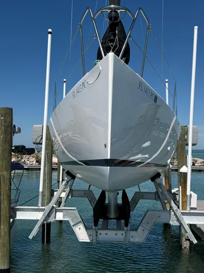 Encore Yacht Photos Pics 2011 J Boats J/95 sailboat on lift, docked in marina.