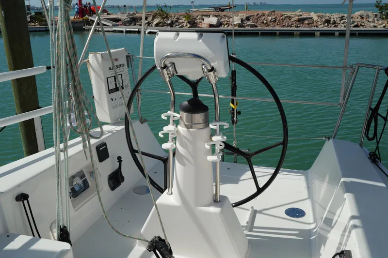Encore Yacht Photos Pics 2011 J Boats J/95 sailboat cockpit with steering wheel and ocean view.