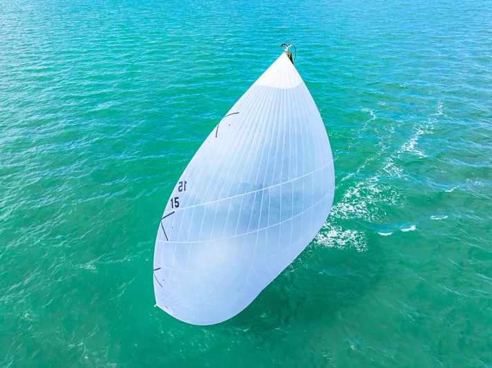 Encore Yacht Photos Pics Sailing yacht J Boats J/95 2011 with spinnaker on turquoise sea.