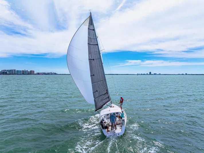 Encore Yacht Photos Pics Sailing J Boats J/95, 2011 model, on open water under clear skies.