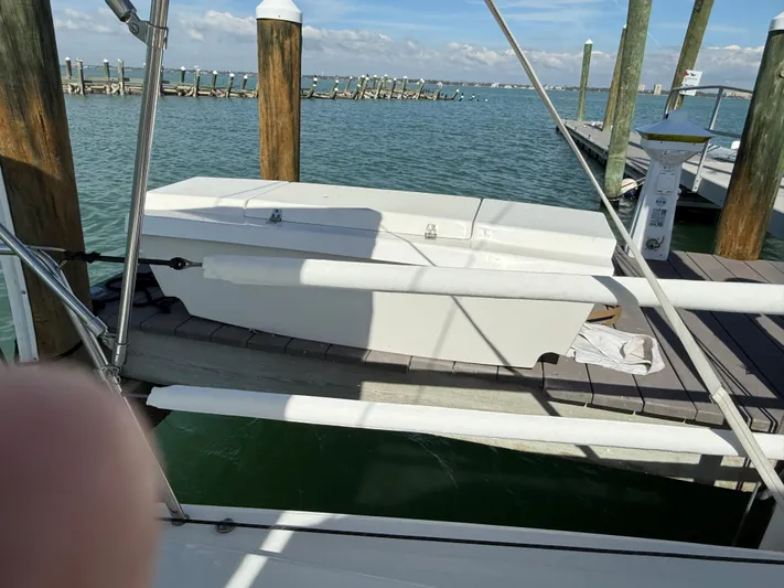 Encore Yacht Photos Pics 2011 J Boats J/95 docked at marina with clear blue water.