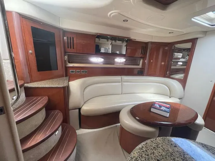 Lucky Duck Yacht Photos Pics Luxurious 2005 Sea Ray 420 Sundancer yacht interior with elegant seating and wooden finishes.