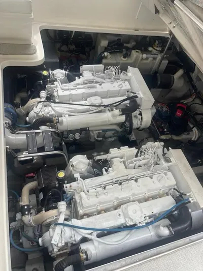 Lucky Duck Yacht Photos Pics Engine compartment of 2005 Sea Ray 420 Sundancer, showcasing dual engines.