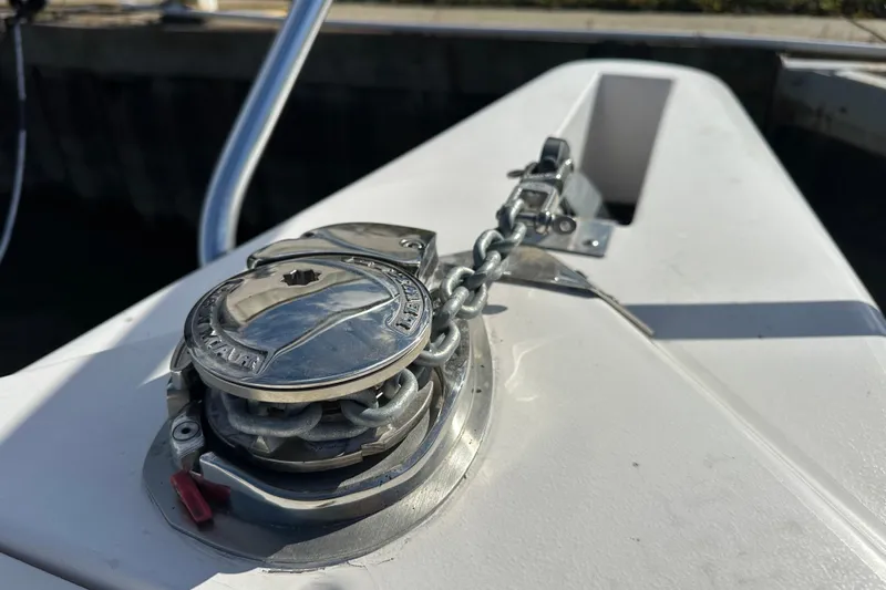  Yacht Photos Pics Anchor chain mechanism on a 1999 Intrepid 339 boat deck.