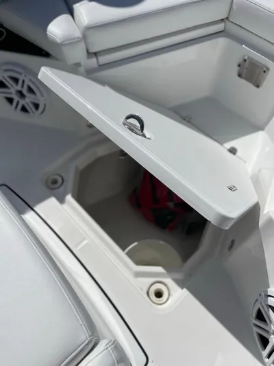  Yacht Photos Pics 2019 Blackfin 272 CC boat storage compartment with open lid, showcasing interior space.