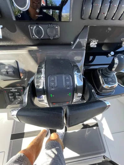  Yacht Photos Pics Close-up of 2019 Blackfin 272 CC boat controls and steering wheel.