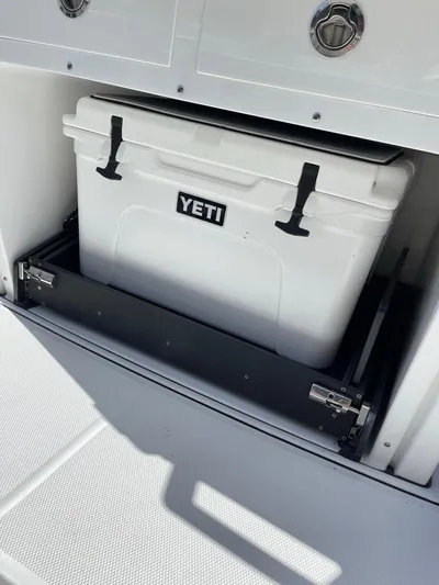  Yacht Photos Pics 2019 Blackfin 272 CC boat with Yeti cooler in storage compartment.