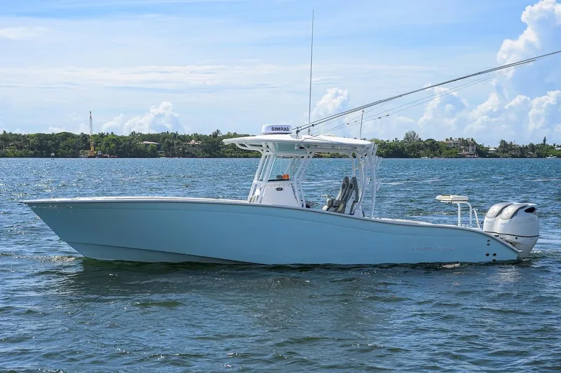  Yacht Photos Pics 2024 Cape Horn 31 T boat on water, clear sky, side view.