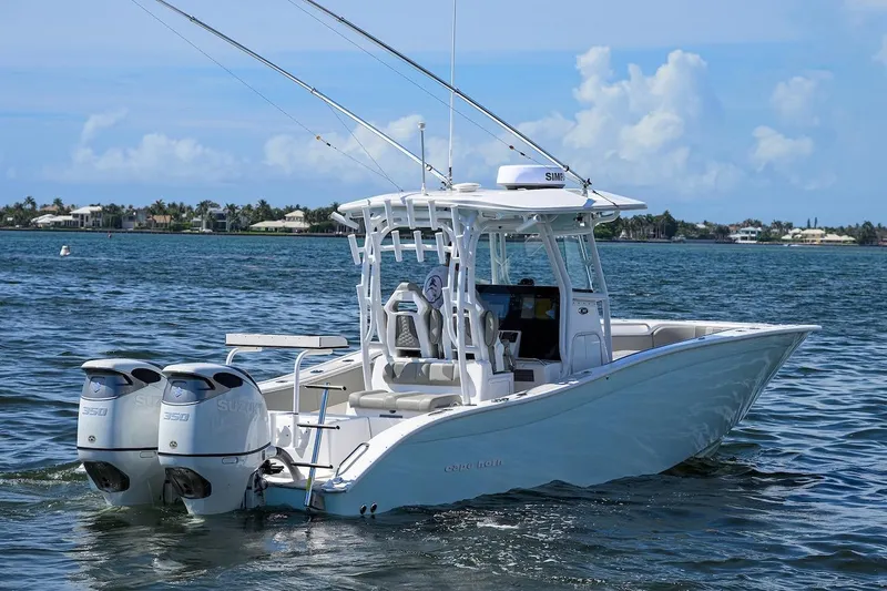  Yacht Photos Pics 2024 Cape Horn 31 T boat on water with dual Suzuki engines.