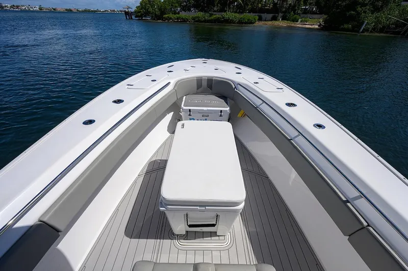  Yacht Photos Pics 2024 Cape Horn 31 T boat interior with seating and storage, on calm water.