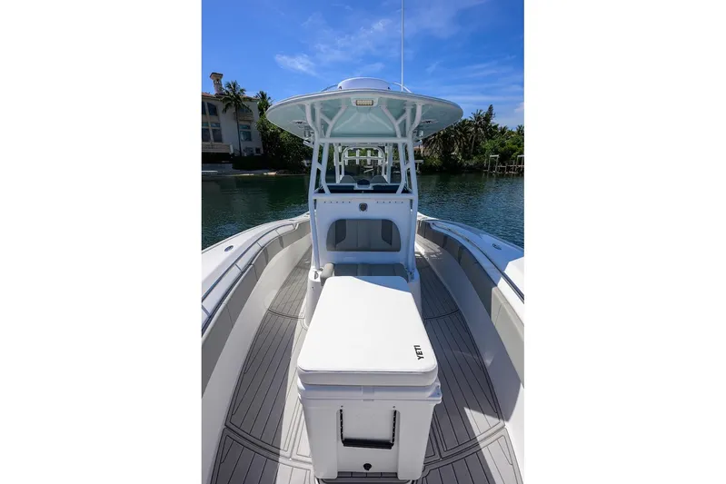  Yacht Photos Pics 2024 Cape Horn 31 T boat, sleek design, spacious deck, sunny waterfront setting.