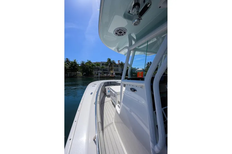  Yacht Photos Pics 2024 Cape Horn 31 T boat on water, sleek design, sunny day, waterfront view.