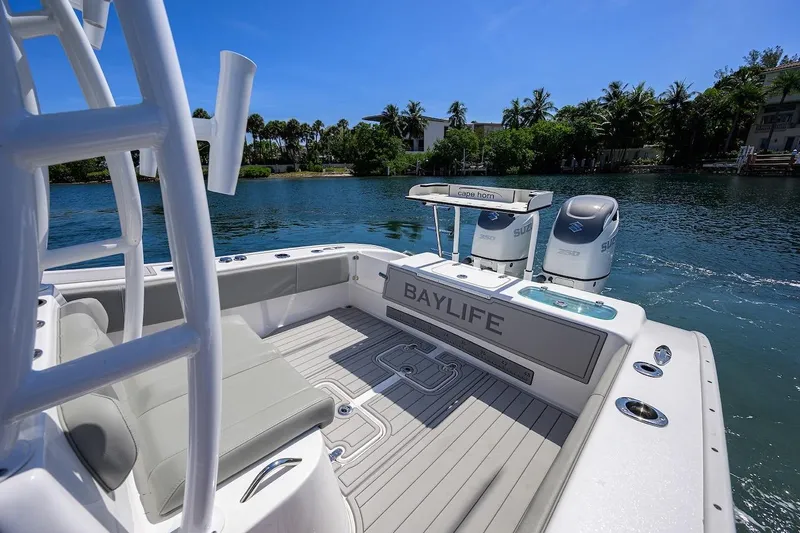 Yacht Photos Pics 2024 Cape Horn 31 T boat with dual engines on a sunny day by the water.