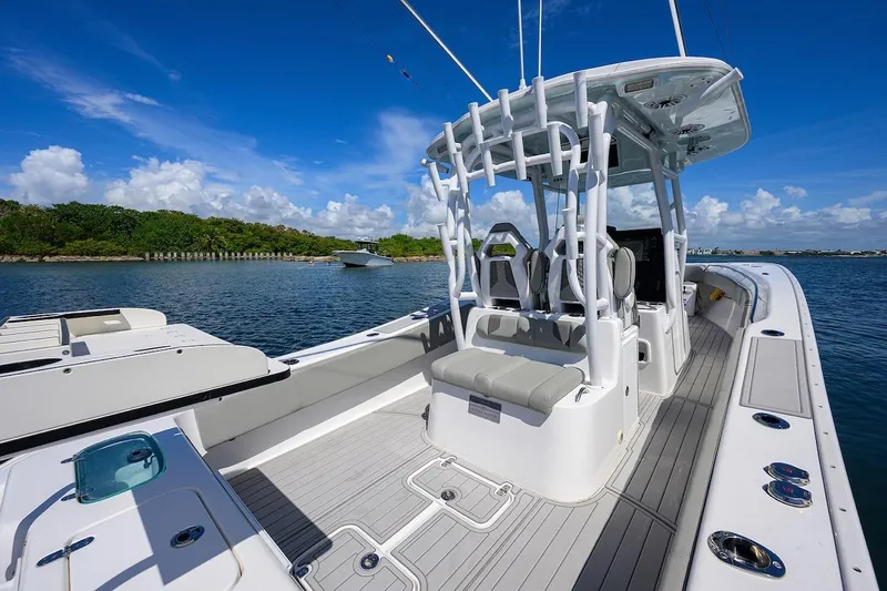  Yacht Photos Pics 2024 Cape Horn 31 T boat on water, featuring spacious deck and modern design.