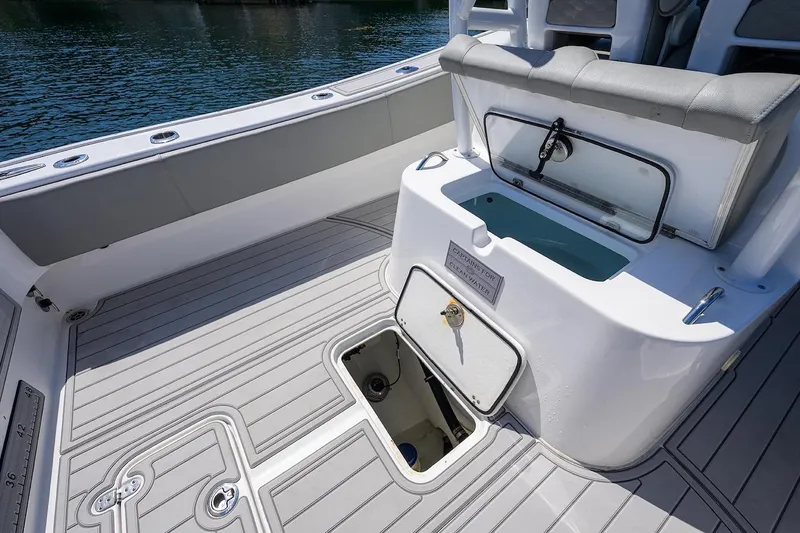  Yacht Photos Pics 2024 Cape Horn 31 T boat interior with storage compartments and seating.