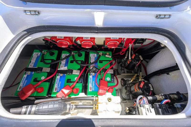  Yacht Photos Pics 2024 Cape Horn 31 T boat battery compartment with multiple batteries and wiring.