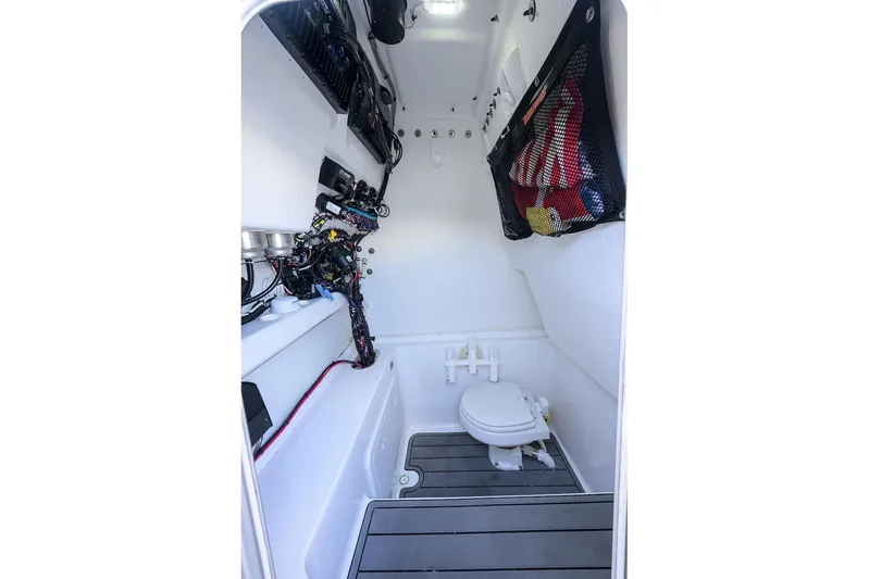  Yacht Photos Pics 2024 Cape Horn 31 T boat interior with toilet and storage area.
