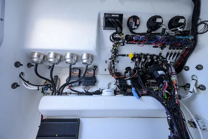  Yacht Photos Pics Electrical wiring system of 2024 Cape Horn 31 T boat, showcasing organized cables and components.