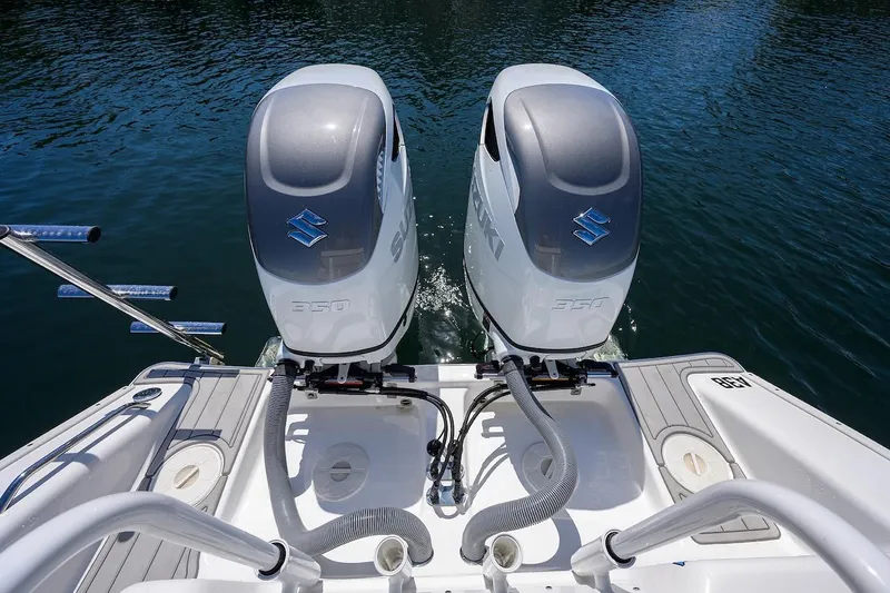  Yacht Photos Pics 2024 Cape Horn 31 T boat with dual Suzuki 350 outboard engines on water.