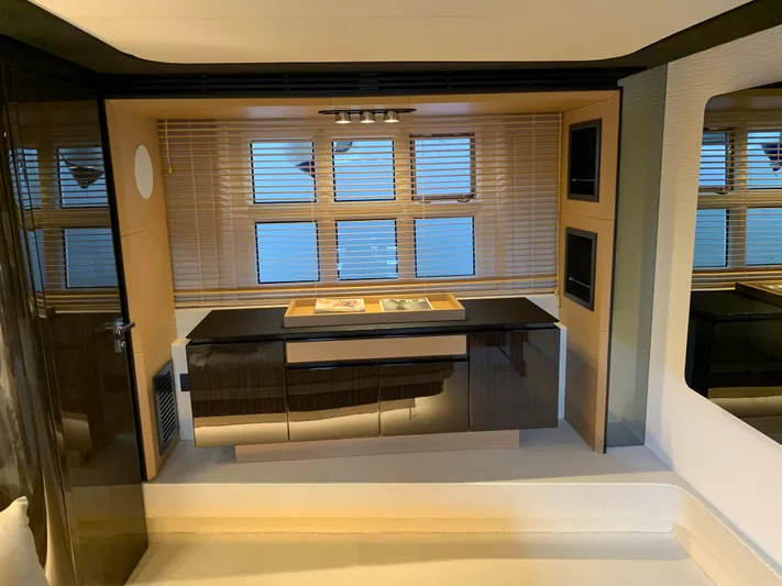 Fantastic Yacht Photos Pics Interior of 2019 Azimut 77S yacht with modern cabinetry and window blinds.