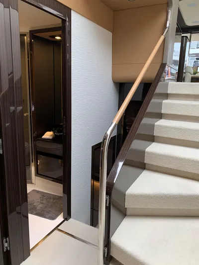 Fantastic Yacht Photos Pics Interior staircase of 2019 Azimut 77S yacht with modern design.