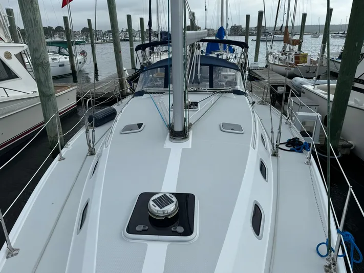 J Renee Yacht Photos Pics 2004 Catalina 42 MkII sailboat docked at marina, view of deck and mast.