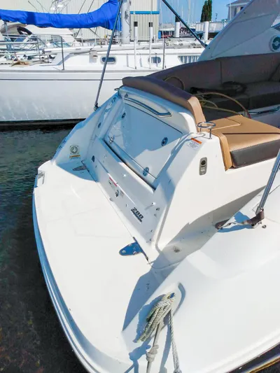 280 Sundancer Yacht Photos Pics 2016 Sea Ray 280 Sundancer boat docked, featuring sleek design and spacious deck.