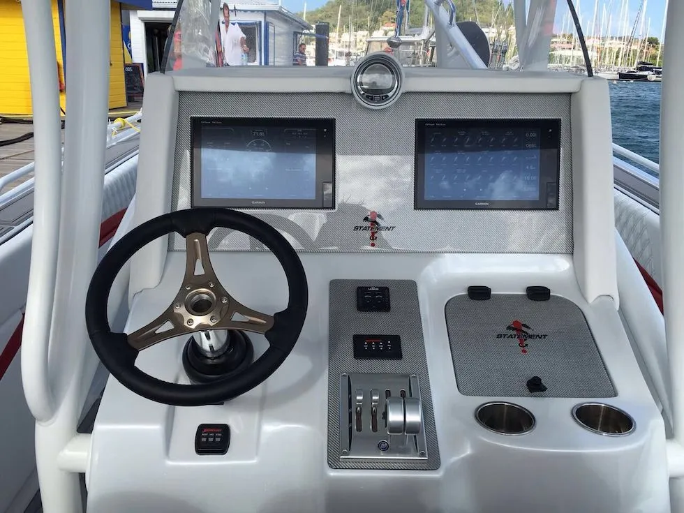 2017 Statement 380 SUV Cuddy helm with dual screens and modern controls.