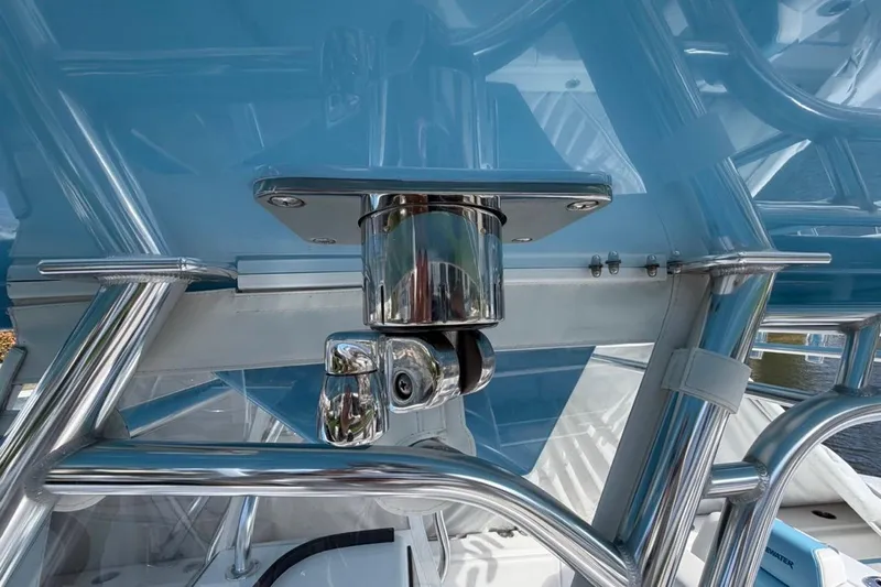  Yacht Photos Pics 2022 Bluewater 2850 CC boat detail with stainless steel fittings and blue canopy.