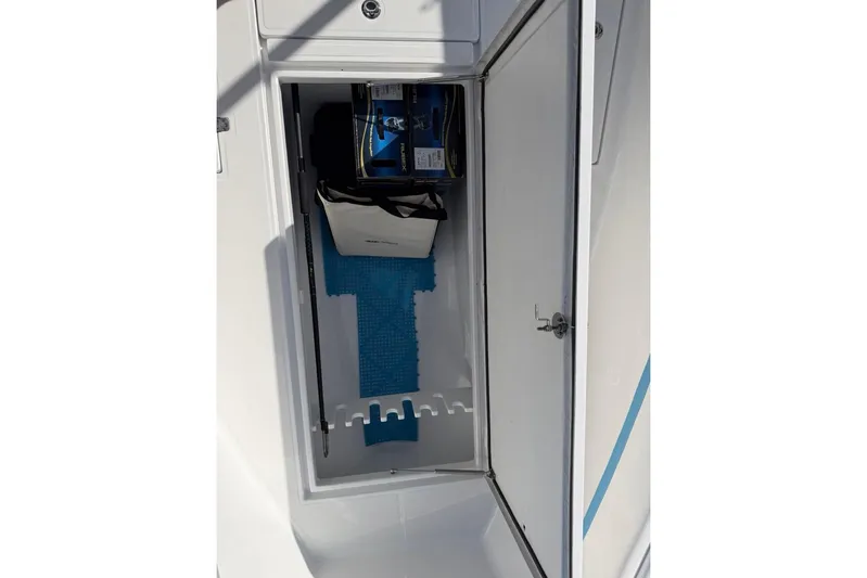  Yacht Photos Pics Storage compartment of 2022 Bluewater 2850 CC boat with equipment inside.