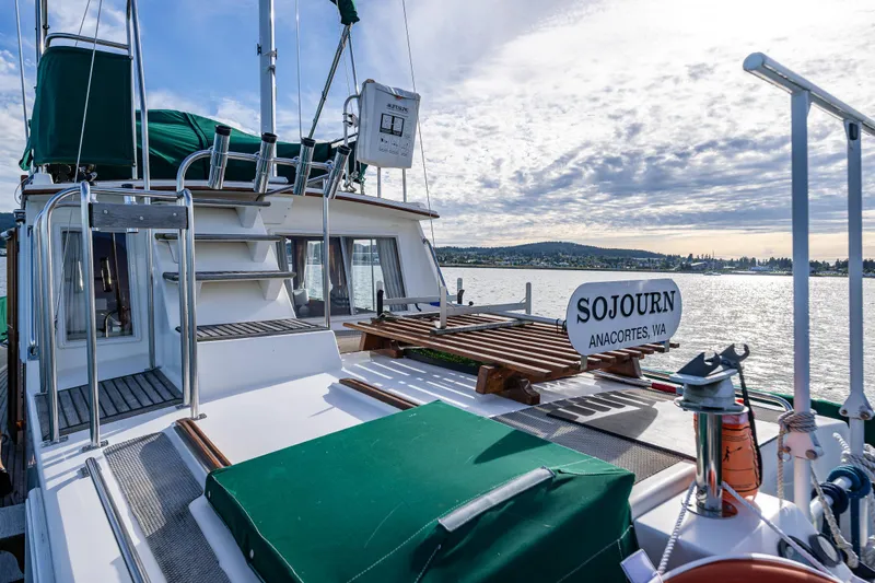Sojourn Yacht Photos Pics Grand Banks 36 Classic yacht, 1990 model, docked with scenic water view.