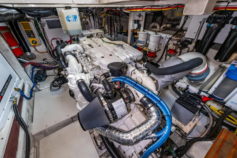 Sojourn Yacht Photos Pics Engine room of a 1990 Grand Banks 36 Classic, showcasing detailed mechanical components.