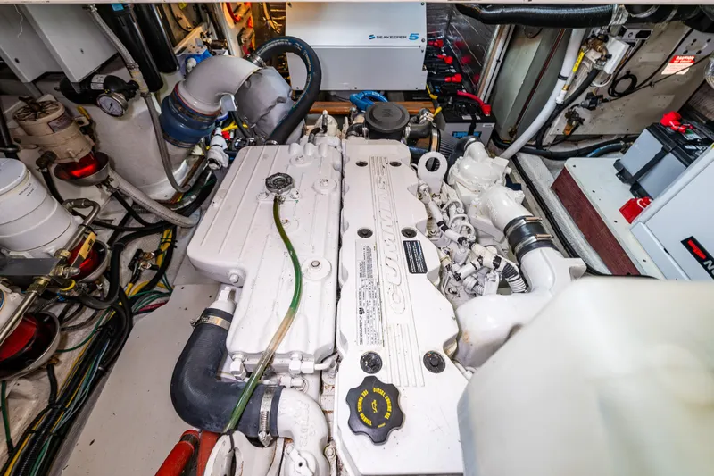 Sojourn Yacht Photos Pics Engine room of a 1990 Grand Banks 36 Classic boat, showcasing mechanical components.