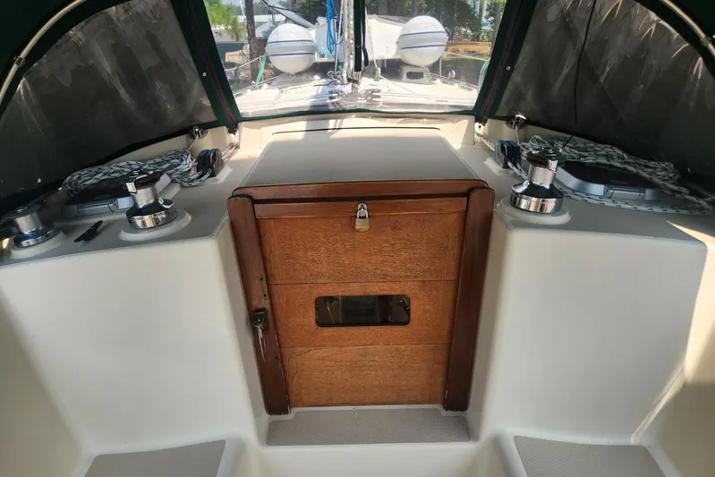 Ramble On Yacht Photos Pics Cockpit of 2000 Island Packet 380 sailboat with wooden hatch and winches.