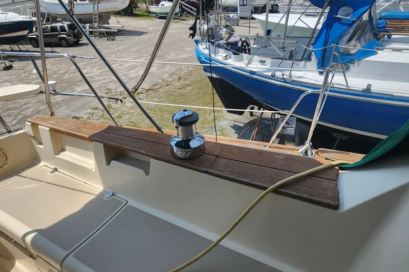 Ramble On Yacht Photos Pics Cockpit view of a 2000 Island Packet 380 sailboat in a marina.