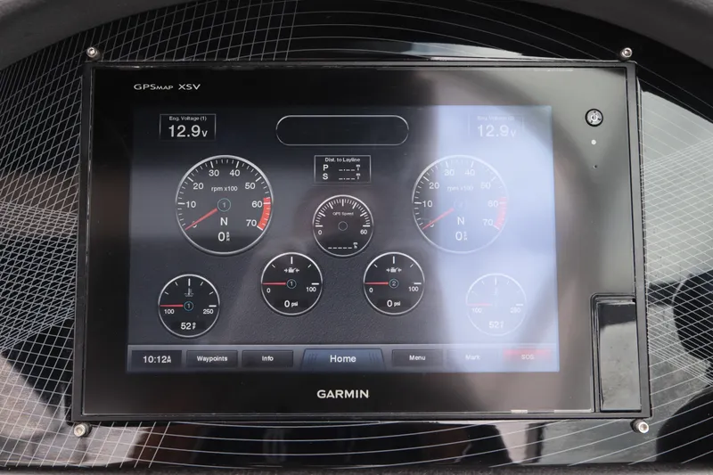  Yacht Photos Pics Garmin GPS display on 2018 Regal 29 OBX boat dashboard showing engine metrics.
