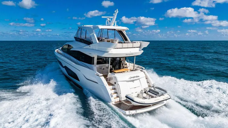 My Inspiration Yacht Photos Pics 2019 Sunseeker Manhattan 66 yacht cruising on open sea under blue sky.