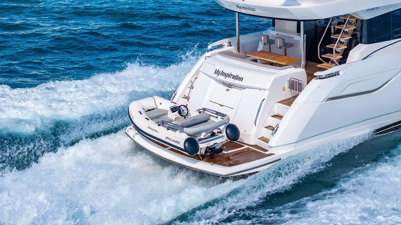 My Inspiration Yacht Photos Pics 2019 Sunseeker Manhattan 66 yacht cruising on open water, showcasing luxury and performance.