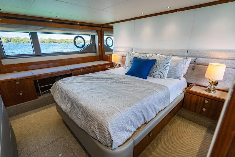 My Inspiration Yacht Photos Pics Luxurious bedroom interior of 2019 Sunseeker Manhattan 66 yacht with elegant decor and scenic window views.