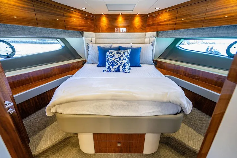My Inspiration Yacht Photos Pics Luxurious bedroom interior of 2019 Sunseeker Manhattan 66 yacht with elegant wood finishes.
