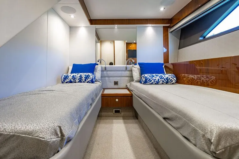 My Inspiration Yacht Photos Pics Luxurious cabin interior of 2019 Sunseeker Manhattan 66 yacht with twin beds and elegant decor.
