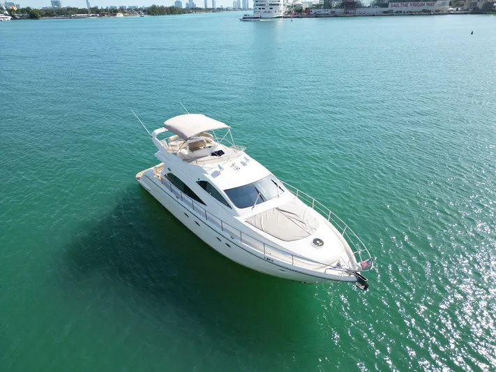 2003 Aicon Yacht 56 Yacht Photos Pics Aicon 56 yacht from 2003 on clear blue water.