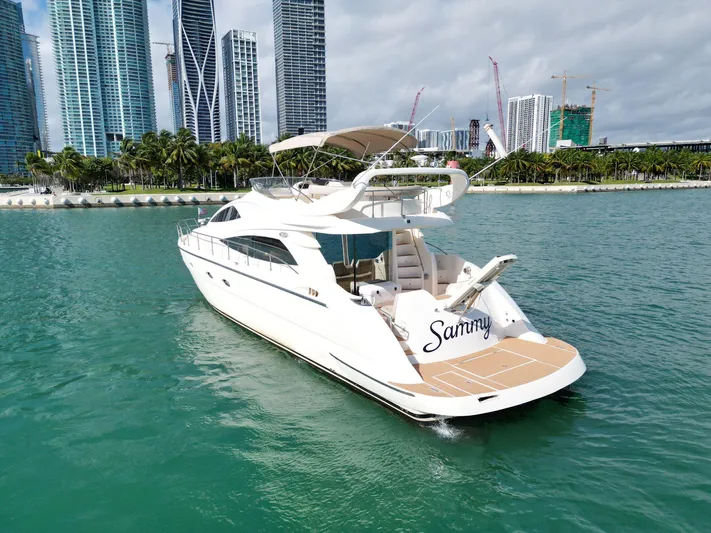 2003 Aicon Yacht 56 Yacht Photos Pics Luxurious 2003 Aicon 56 yacht cruising near city skyline.