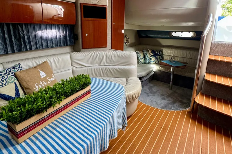 40 Formula Pc Yacht Photos Pics Luxurious interior of a 2006 Formula 40 PC yacht with elegant seating and nautical decor.