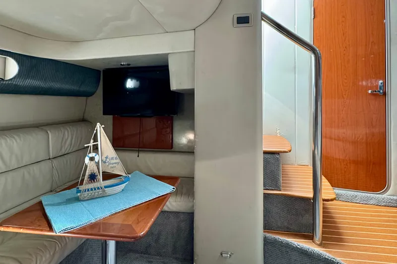 40 Formula Pc Yacht Photos Pics Interior of 2006 Formula 40 PC yacht with cozy seating and decorative sailboat.